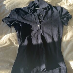 Women’s Lacoste navy golf shirt